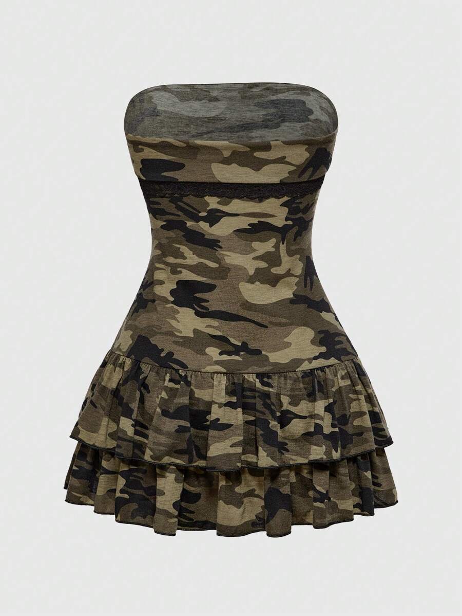 Close-up of tiered peplum detail on fitted party mini dress
