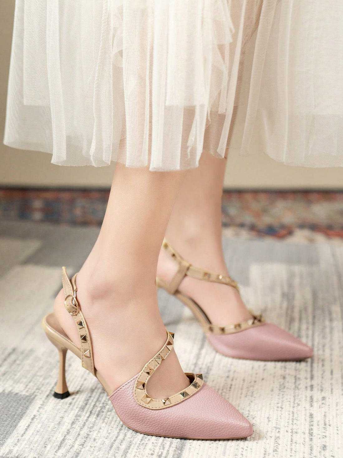 Step into the ultimate party shoe - our Chic Pink High Heel Sandals! These strappy stilettos add a touch of charm to any summer occasion, with a rivet toe cap for added style. Perfect for dancing the night away or standing out at a special event.