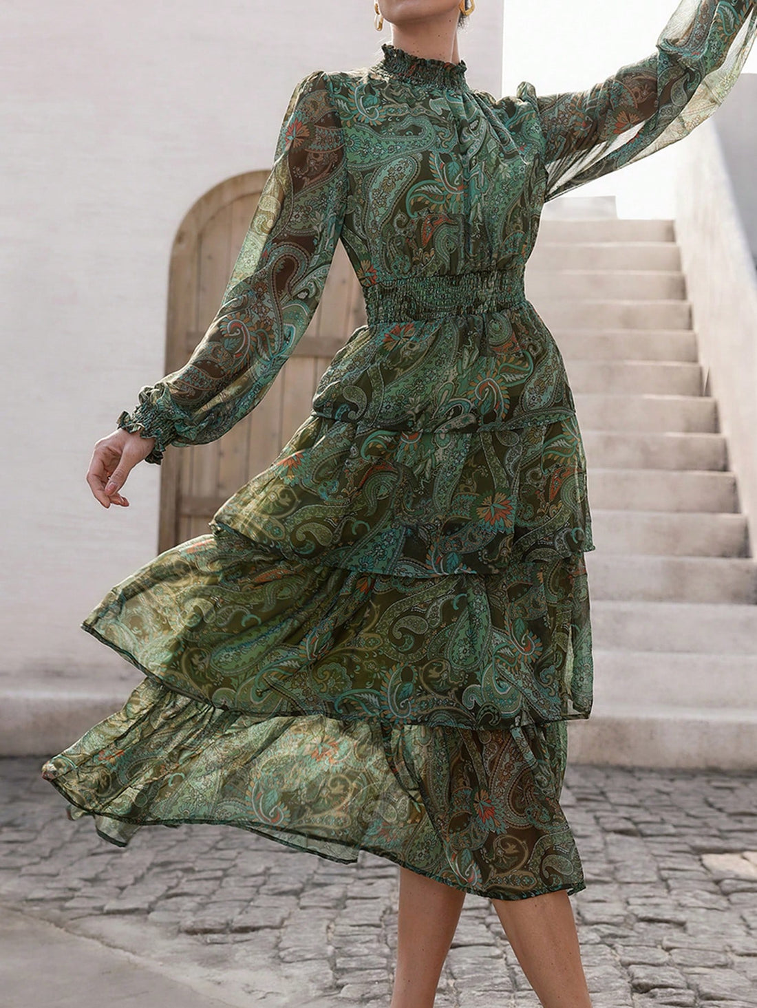 Unleash your inner fashionista with our trendy women's dress. Its lantern sleeves and paisley print will have you turning heads on your next vacation. Step out in style and make a statement with the perfect outfit for any getaway. Pack it now and thank us later!