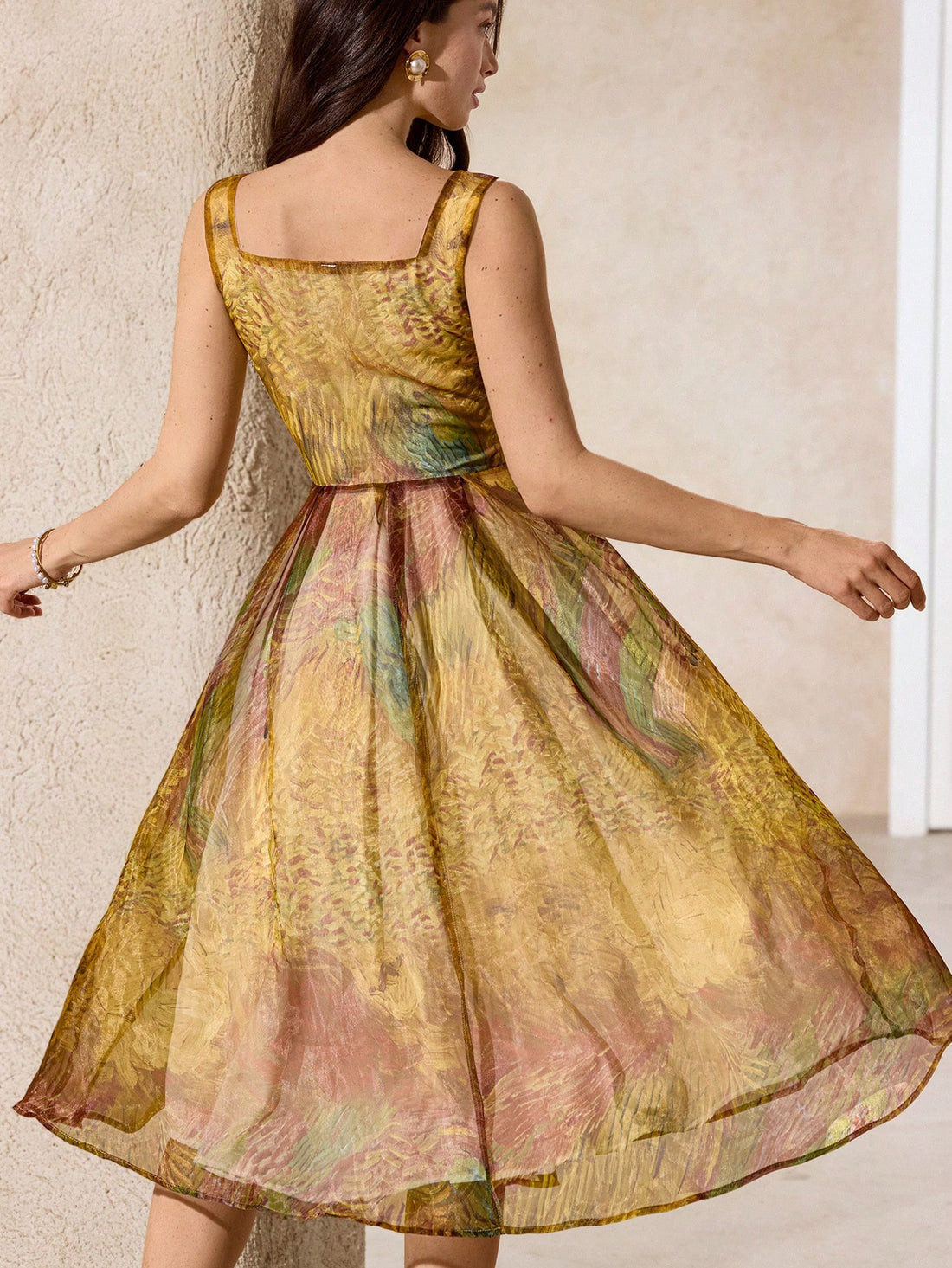 Brighten your wardrobe with this stunning Van Gogh Sunflower Print Organza Dress. Its airy organza fabric gives a dreamy, light feel, while the backless boho design adds a playful twist perfect for dancing under the sun or stars. Designed for all seasons, this dress lets you carry the warmth and charm of sunflowers wherever you go. Embrace art and style in one effortlessly chic look!