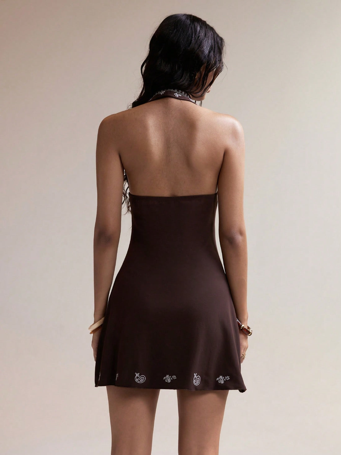 Turn heads wherever you go with this chic embroidered bodycon dress featuring a daring deep V-neck. Perfect for boho vacations and festival fun, its flattering fit hugs your curves while the intricate embroidery adds a whimsical touch. Lightweight and stylish, it’s your go-to for effortless flair and endless compliments.