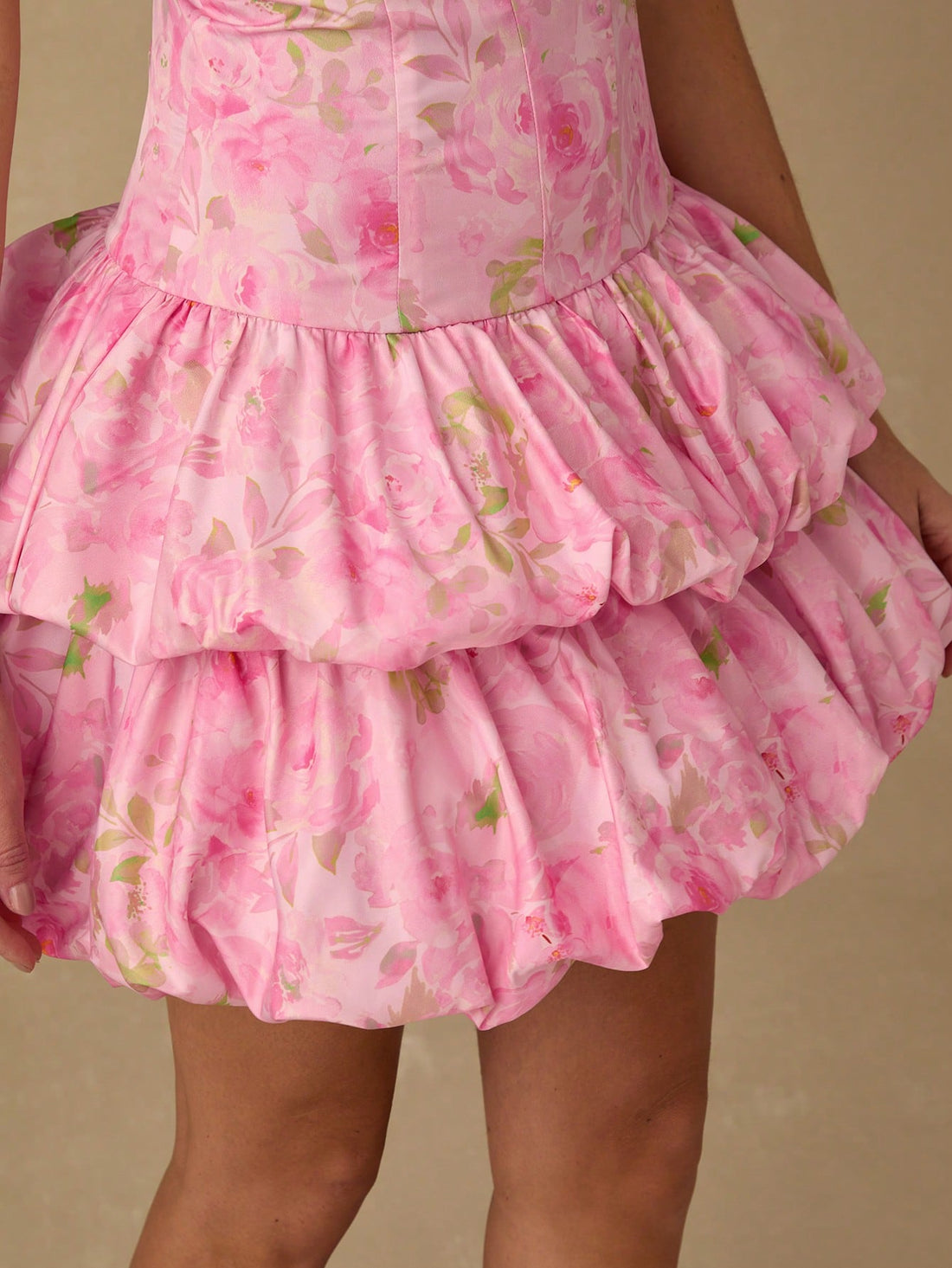 Get ready to charm your way through summer with our Charming Pink Floral Tube Mini Dress! This versatile and stylish dress is perfect for any summertime occasion - from relaxing beach outings to elegant events. With its floral design and lightweight fabric, it's the must-have dress for your vacation wardrobe.