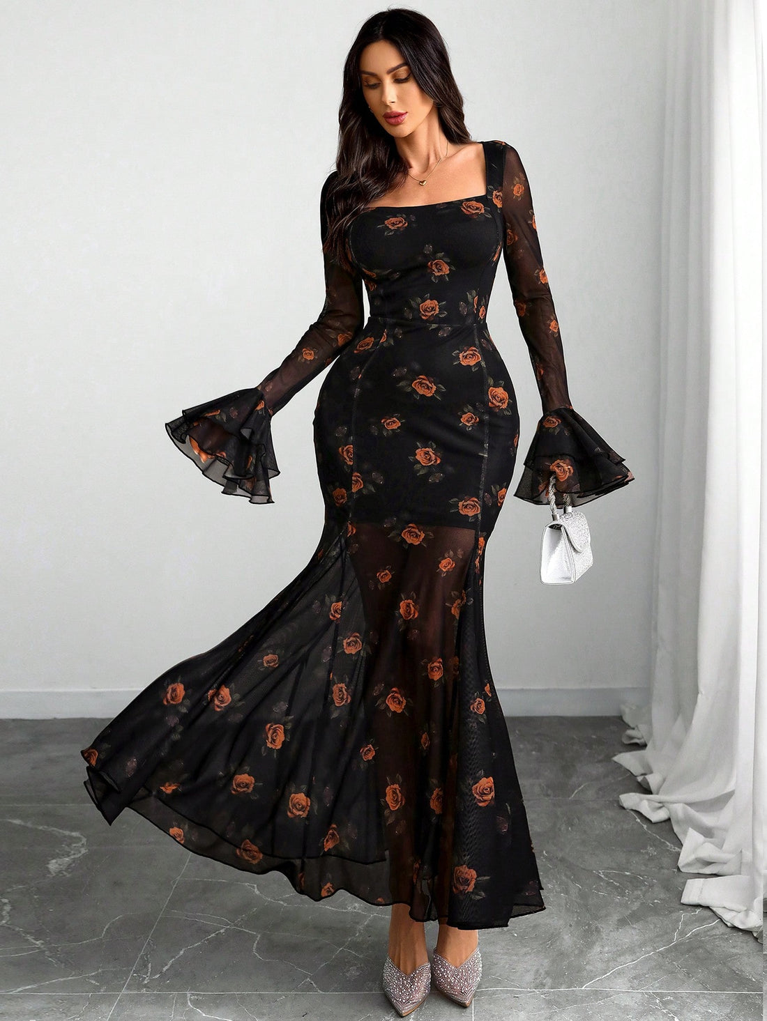 Dive into dark elegance with this show-stopping Gothic mermaid dress that's equal parts mysterious and mesmerizing. The floral double sleeves add a romantic twist to the edgy silhouette, while the sexy slim fit hugs your curves in all the right ways. Perfect for making a bold statement at gothic events, alternative fashion shows, or whenever you want to channel your inner sea siren with serious attitude. This dress transforms you into a captivating vision of modern gothic glamour.