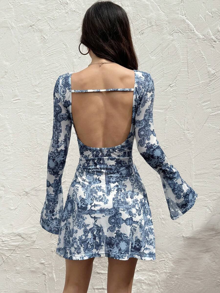 Get your heart racing with this chic V-neck mini dress! Featuring an elegant allover heart print, this dress is perfect for summer. Whether you're going on a date or hitting up a music festival, this dress is sure to turn heads and make you stand out. Love at first wear!