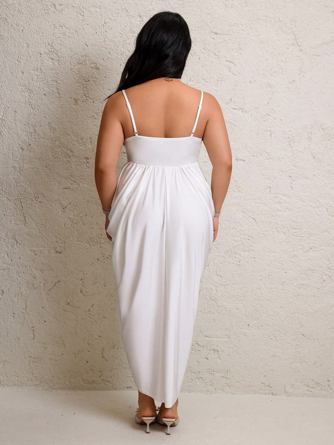 Step out in style with this Chic Plus Size Lace Patchwork Dress, designed for trendsetters who love a playful twist. Featuring delicate lace patchwork and a side pleated split, this dress adds movement and flair to every step. The adjustable strap ensures a perfect fit, making it as comfortable as it is eye-catching. Perfect for turning heads at any event, this dress celebrates curves with confidence and charm.