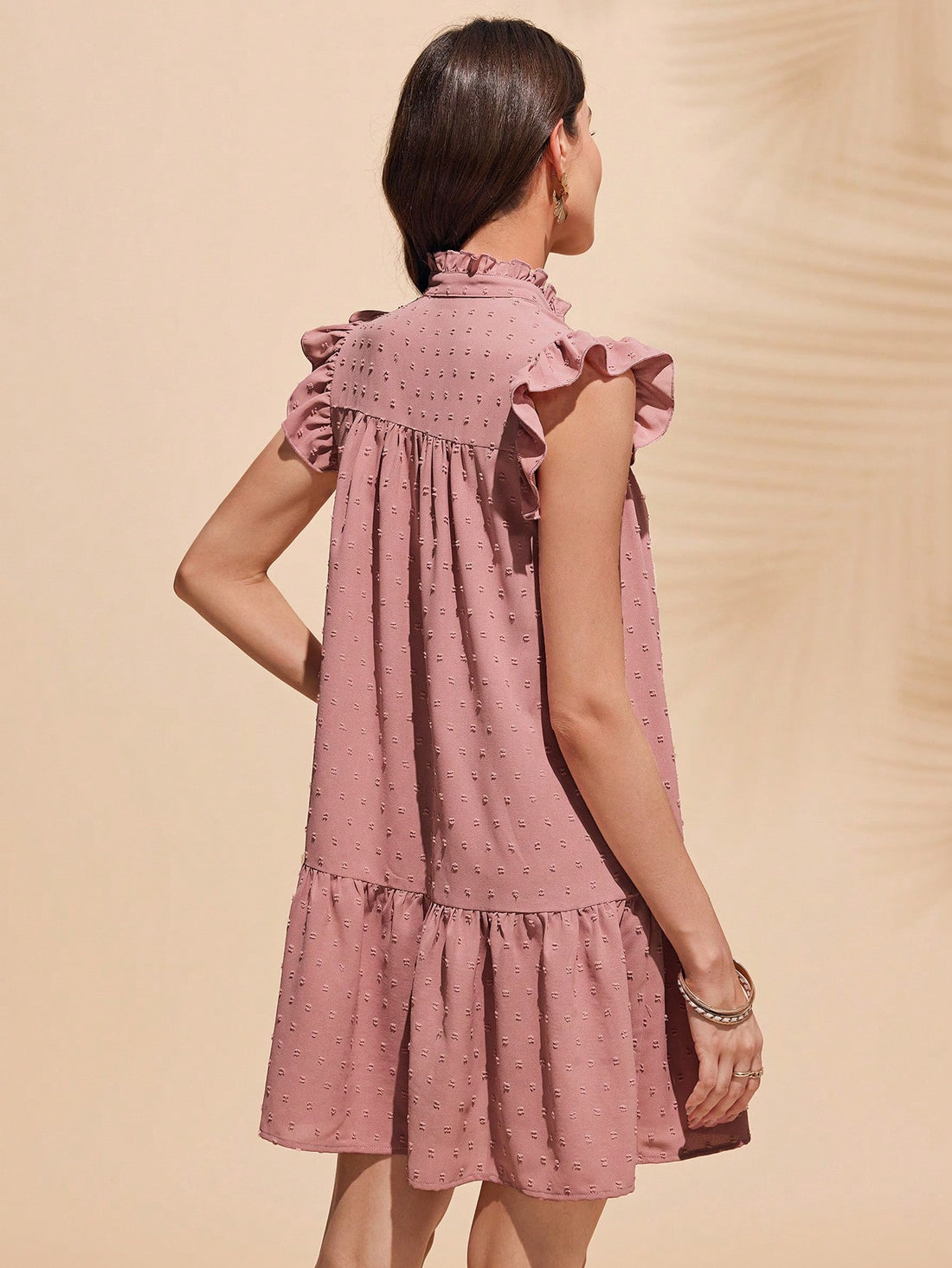 Upgrade your wardrobe with our elegant pale pink mini dress. Perfect for any occasion, this chic style will make a statement wherever you go. Feel confident and stylish with this must-have dress.