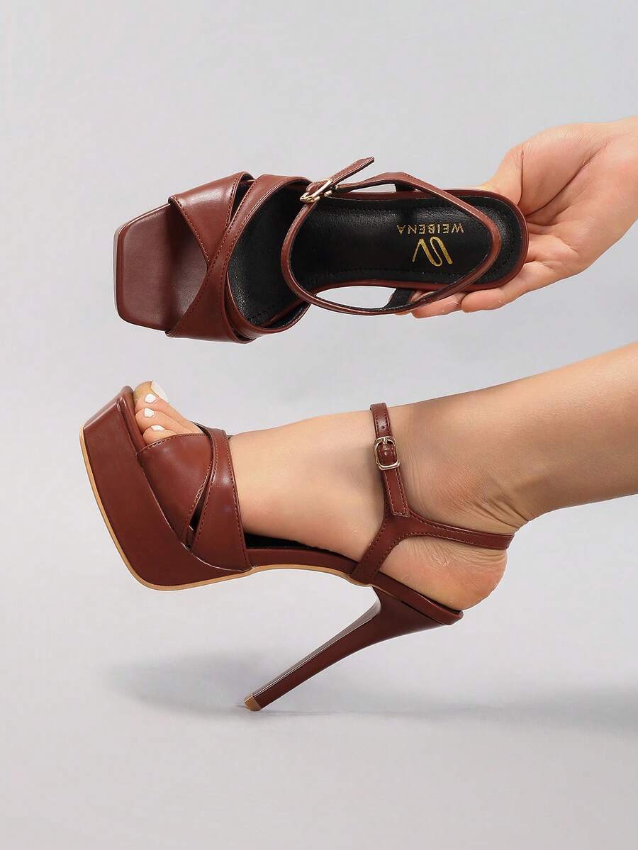 Black strappy stiletto platform sandal view 5 with open toe and ankle strap
