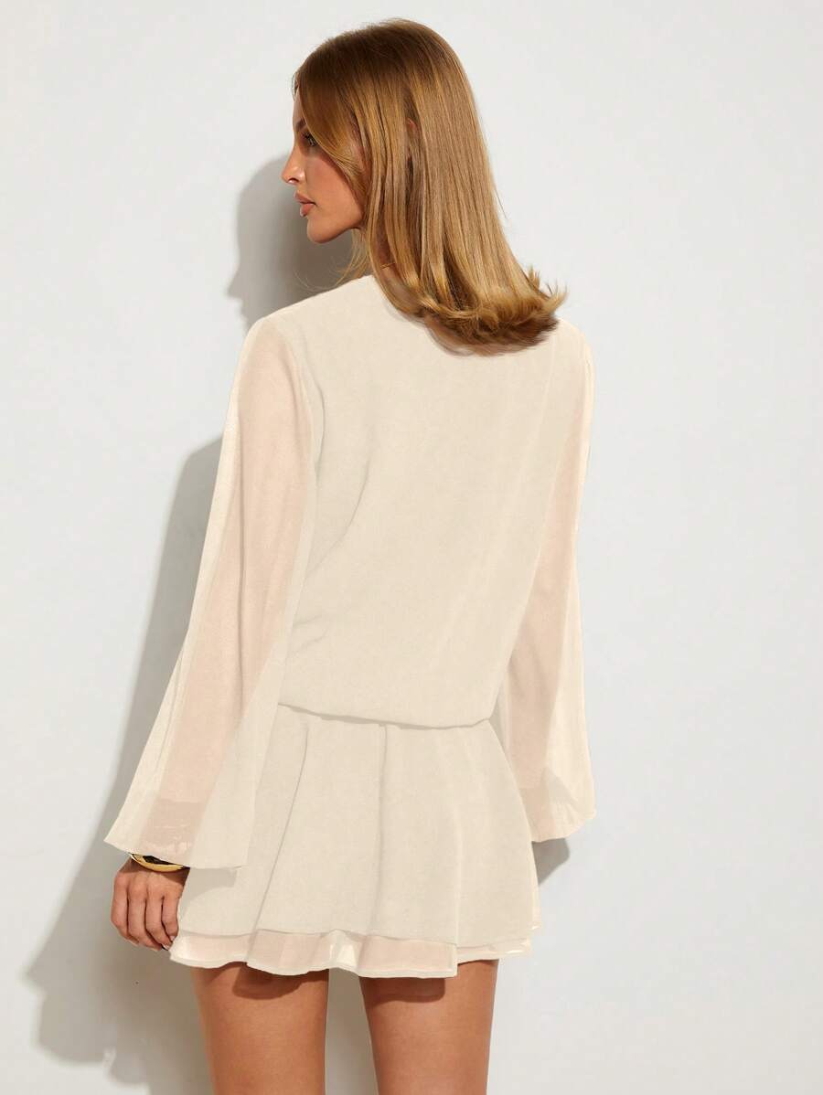 This chic solid color mini dress is a must-have for your summer wardrobe, blending effortless elegance with modern style. Featuring a flattering long sleeve silhouette and a classic minimalist design, it offers a sophisticated yet playful look suitable for everything from brunch dates to sunset parties. Crafted from lightweight, breathable fabric, it ensures all-day comfort while maintaining a polished appearance. Whether paired with strappy sandals for a casual day out or dressed up with statement heels fo