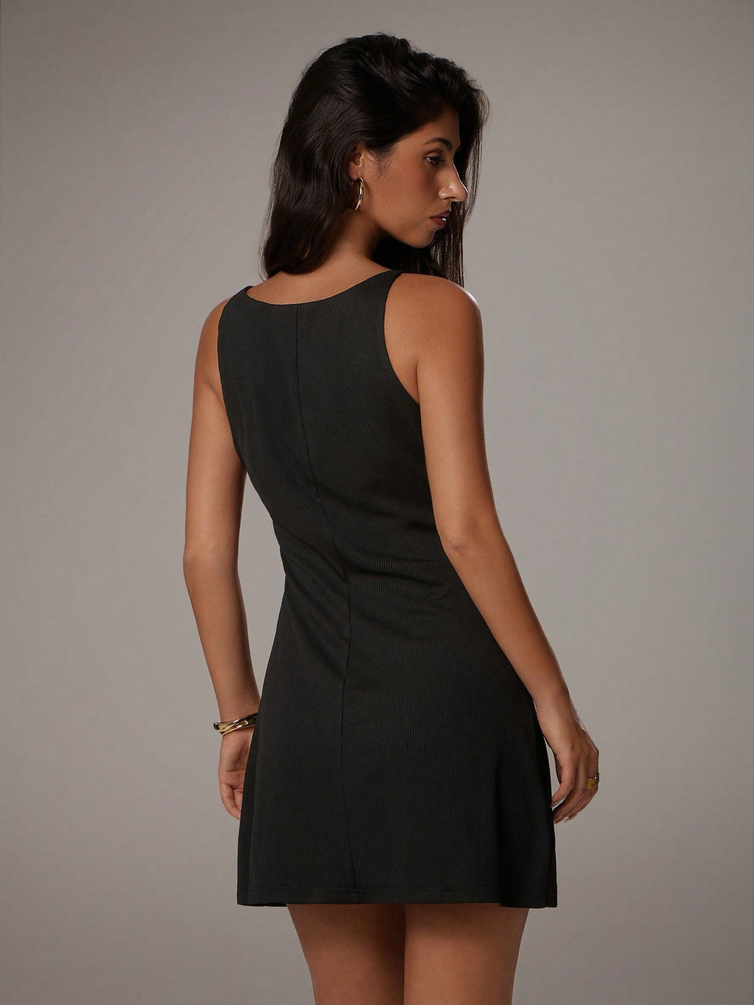 Step into the spotlight with this Elegant Black Mini Dress, perfect for adding a touch of charm to your spring and summer wardrobe. Whether you're aiming for a romantic date night or a chic business casual look, this versatile dress has got you covered. Its flattering cut and timeless black hue make it easy to dress up or down, ensuring you feel confident and playful wherever you go. Embrace effortless style and let this mini dress be your go-to for any occasion!