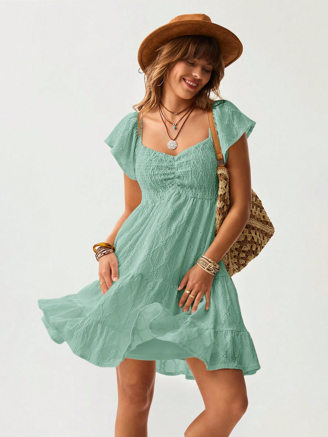 Twirl into summer adventures with this dreamy white mini dress! Delicate ruffles and lace details add a touch of Western romance to your vacation wardrobe. Perfect for beach strolls, outdoor brunches, or sunset cocktails. This playful piece combines casual comfort with head-turning style – just add your favorite sandals and you're ready for whatever the day brings!