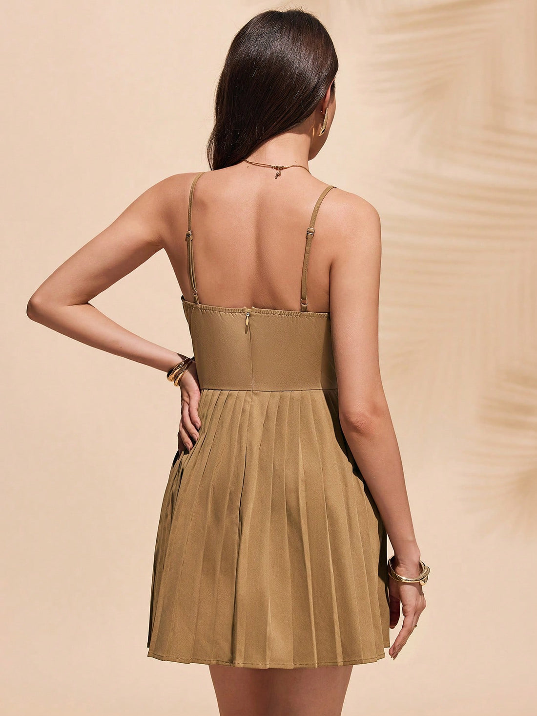 Looking sharp and feeling fabulous - that's what this Women's Slim Fit Pleated Slip Dress is all about! With its sleek and slim fit design, this dress is perfect for stylish and chic evening wear. The pleated detailing adds a touch of elegance, making you stand out at any event.