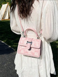 Ivory floral handbag with detachable shoulder strap