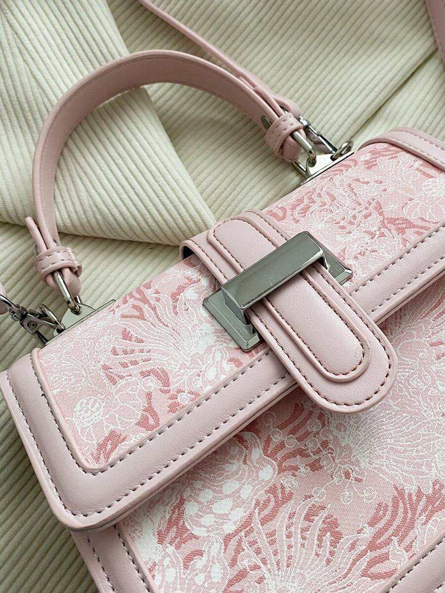 Pink floral handbag with contrast piping