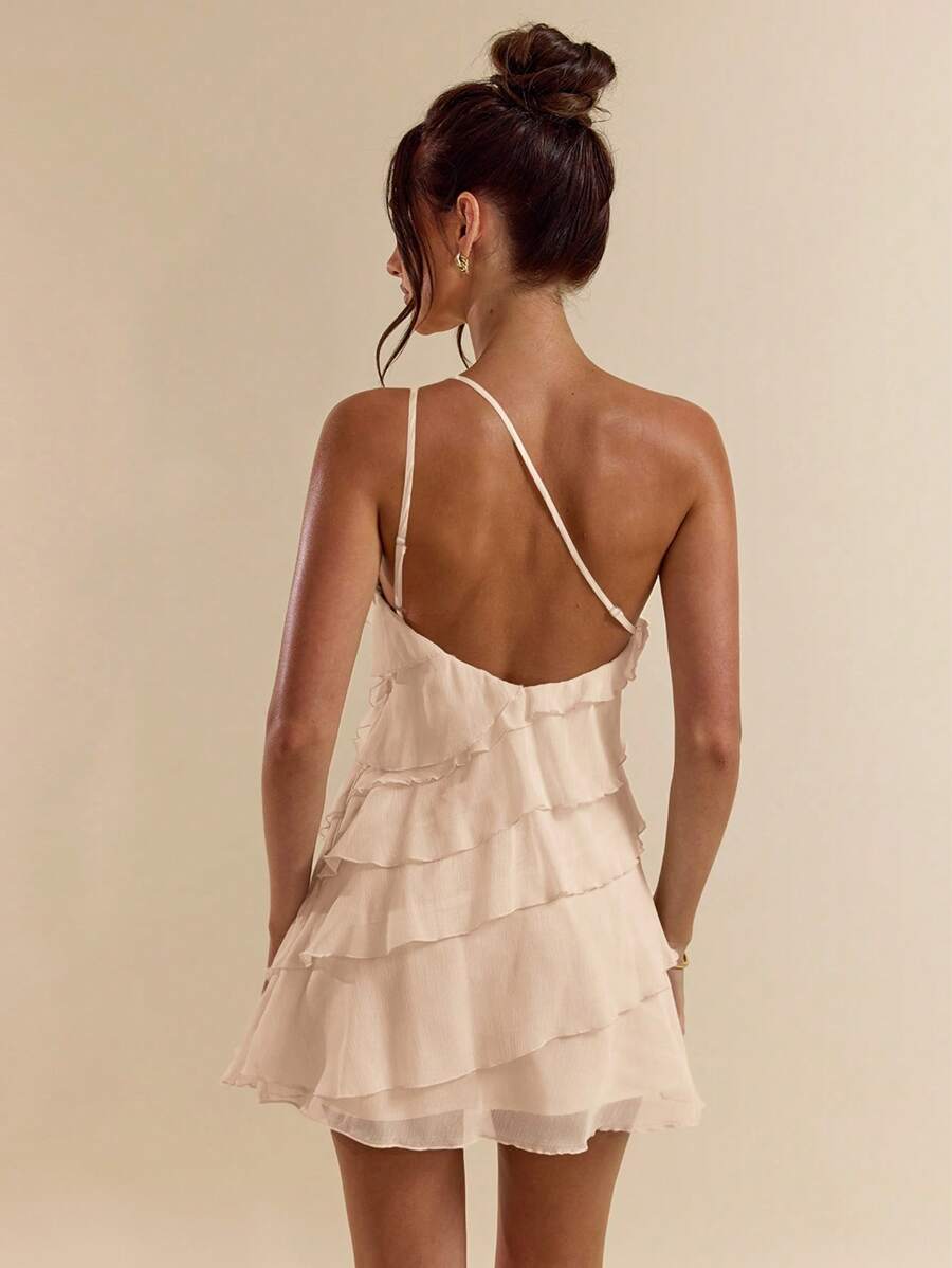 Elevate your summer wardrobe with this stunning apricot layered mini dress. Featuring a chic asymmetrical neckline, tiered layers, and a flattering A-line silhouette, this backless beauty is perfect for beach getaways and evening outings. The sleeveless design keeps you cool while the natural waistline creates a polished look. Crafted from 100% polyester woven fabric with a lined interior, it's both comfortable and durable. Ideal for birthday parties and special occasions, this versatile piece transitions s