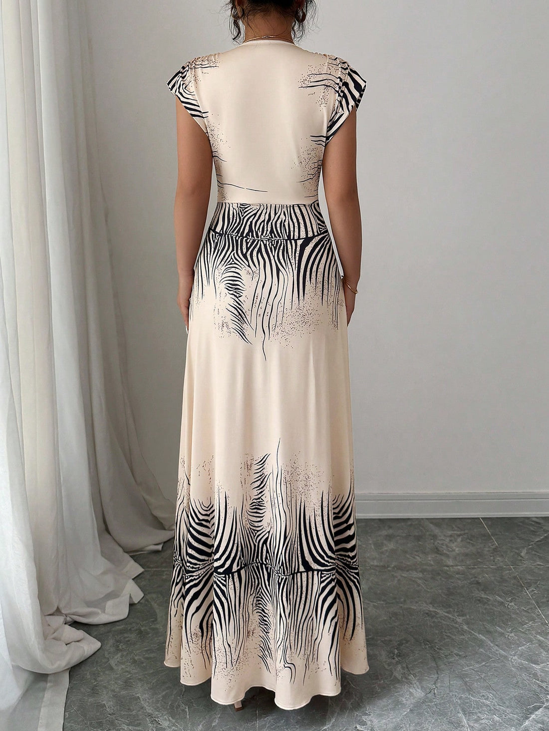 Unleash your wild side in this Elegant Sleeveless Tiger Striped Summer Dress for Women. Perfect for the spring and summer, this fashionable outfit will have you looking fierce yet elegant. Embrace the playful and quirky design while staying cool and stylish in the warm weather. (Tame pun intended.)