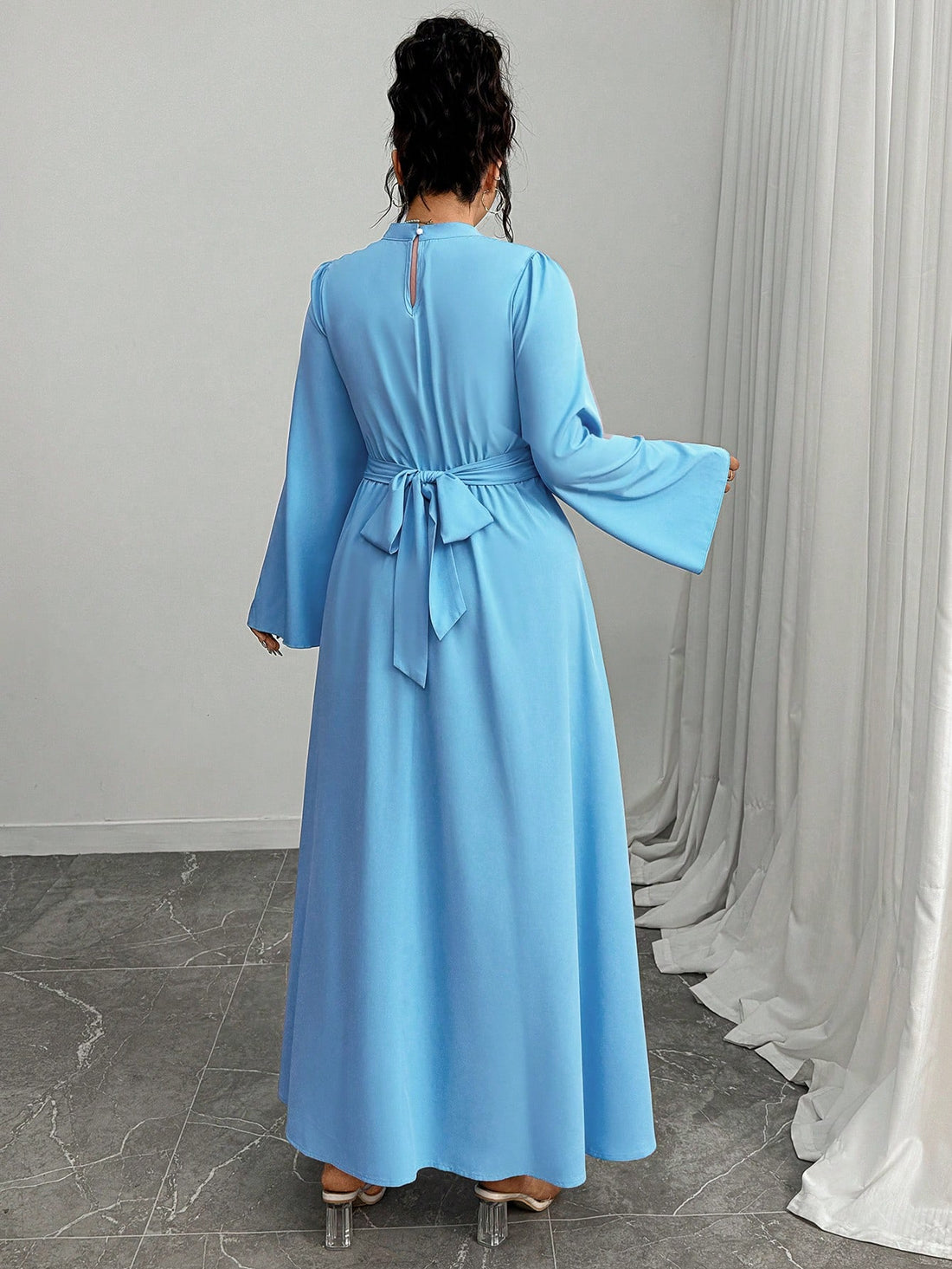 Elevate your seasonal wardrobe with this stunning plus-size dress set, where sparkle meets sophistication. The eye-catching sequin sleeves add just the right amount of glamour, while the cinched belt creates a flattering silhouette that celebrates your curves. Perfect for autumn and winter gatherings, this two-piece ensemble transitions effortlessly from casual outings to special occasions. Dress it up with heels and statement jewelry, or keep it relaxed with sneakers for a chic, modern vibe. Because lookin