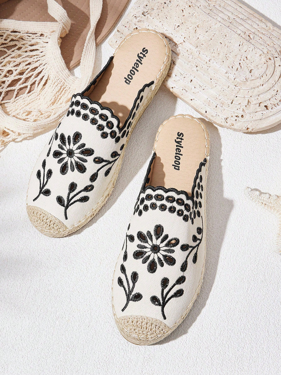 Step into vacation mode with these stylish women's casual slip-on mule shoes! Featuring charming burnout embroidery, they add a playful touch to any outfit. Easy to wear and perfect for relaxed days, these mules combine comfort with a breezy, effortless vibe—ideal for strolling along sunny streets or lounging by the pool.