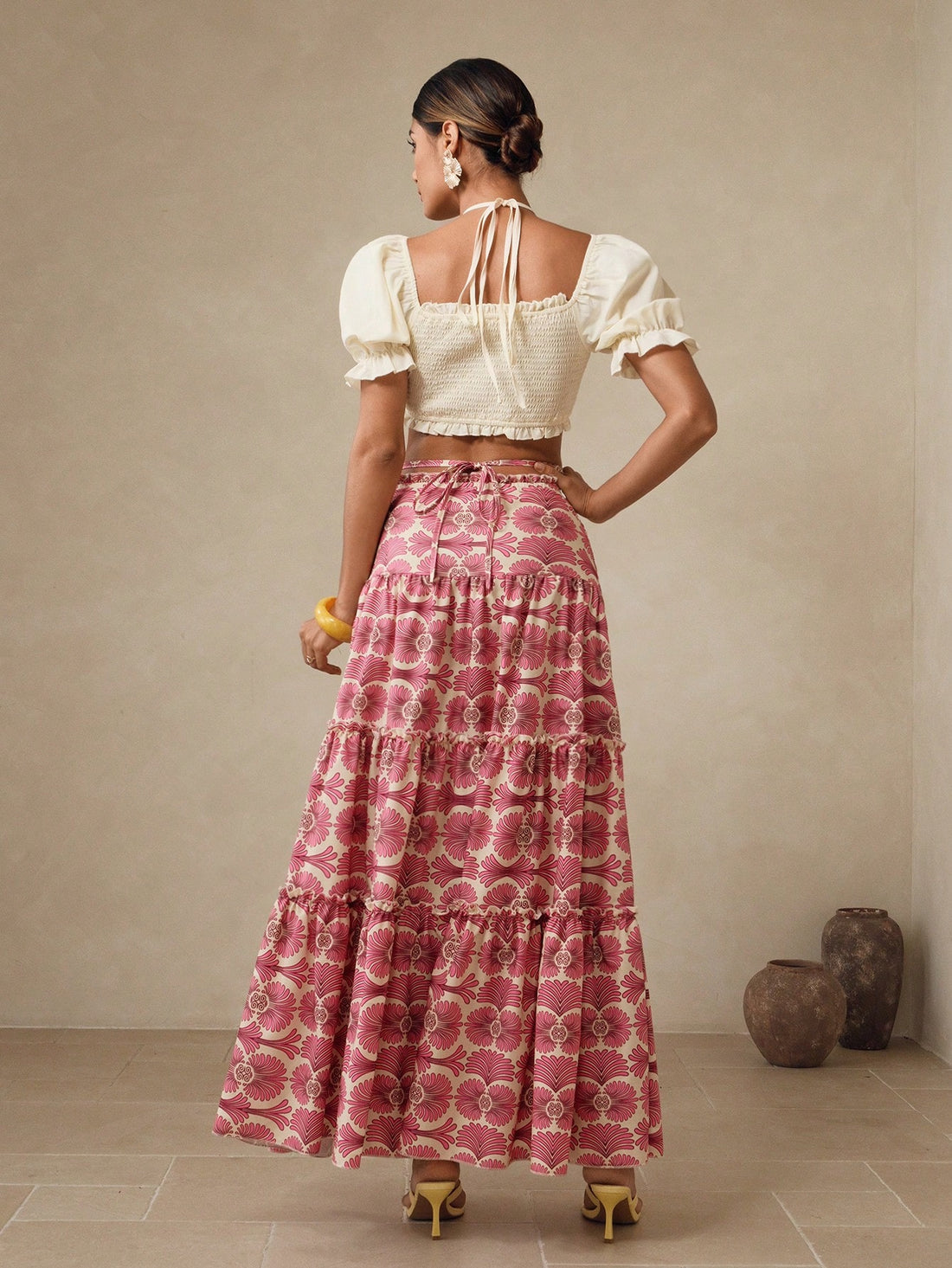 Make a splash this season in our chic sleeveless swim set! Featuring a fitted solid top paired with a flirty ruffle hem skirt, this two-piece combo delivers effortless style for poolside lounging or beach days. The classic silhouette flatters every figure while the playful ruffles add that perfect touch of fun. Mix, match, or wear together—your summer wardrobe just got a major upgrade. Dive into style!