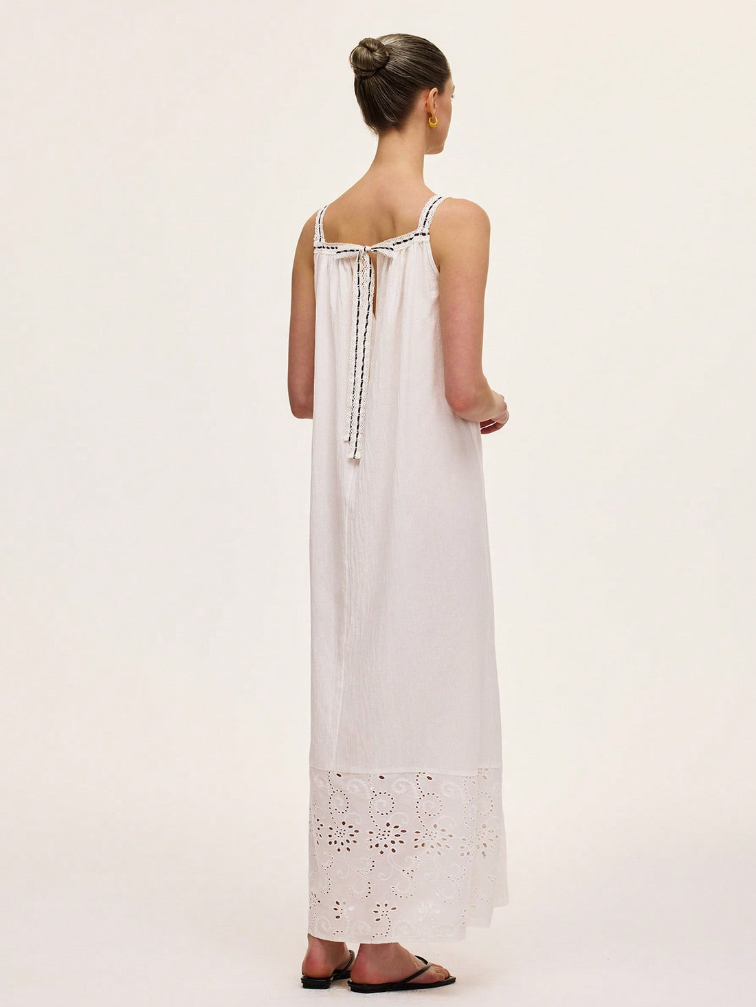 Step into vacation mode with this chic green French retro dress! Featuring delicate spaghetti straps and charming hollow embroidery, it blends vintage flair with breezy comfort. Perfect for sunny strolls or casual gatherings, this dress adds effortless style and a playful touch to your getaway wardrobe.