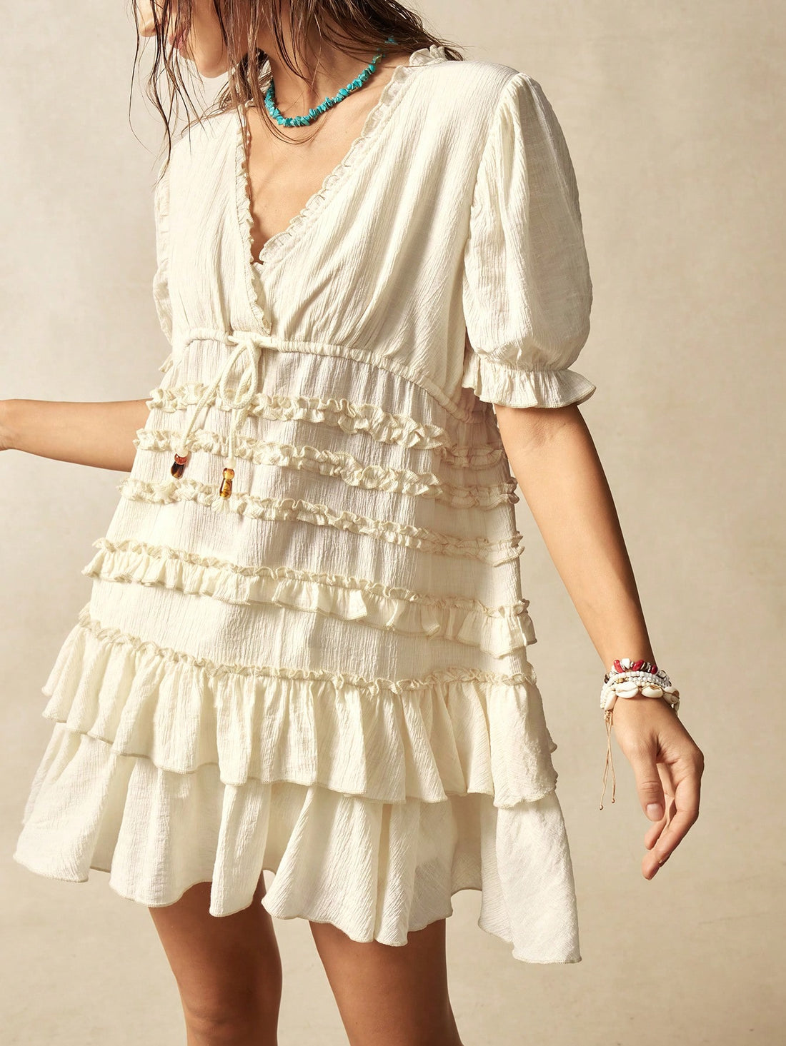 Step into effortless style with this Bohemian Chic mini dress. Featuring a flattering V-neck and short sleeves, it’s perfect for sunny days and casual outings. The playful ruffled hem adds a flirty touch that moves with you. Light and breezy, this dress is designed for fun, comfort, and easygoing moments wherever your day takes you.