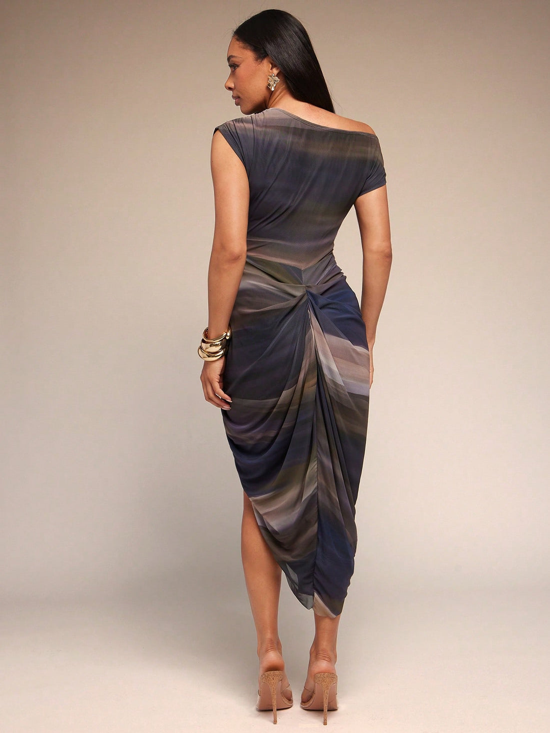 Step into the spotlight with this Marble Ombre Print Asymmetrical Midi Dress! Perfect for birthdays or casual days out, its unique ombre pattern and playful asymmetrical hem add a fun twist to your wardrobe. Flowy and flattering, it’s designed to keep you comfortable while turning heads wherever you go. Celebrate your style with a dress as vibrant and lively as you are!