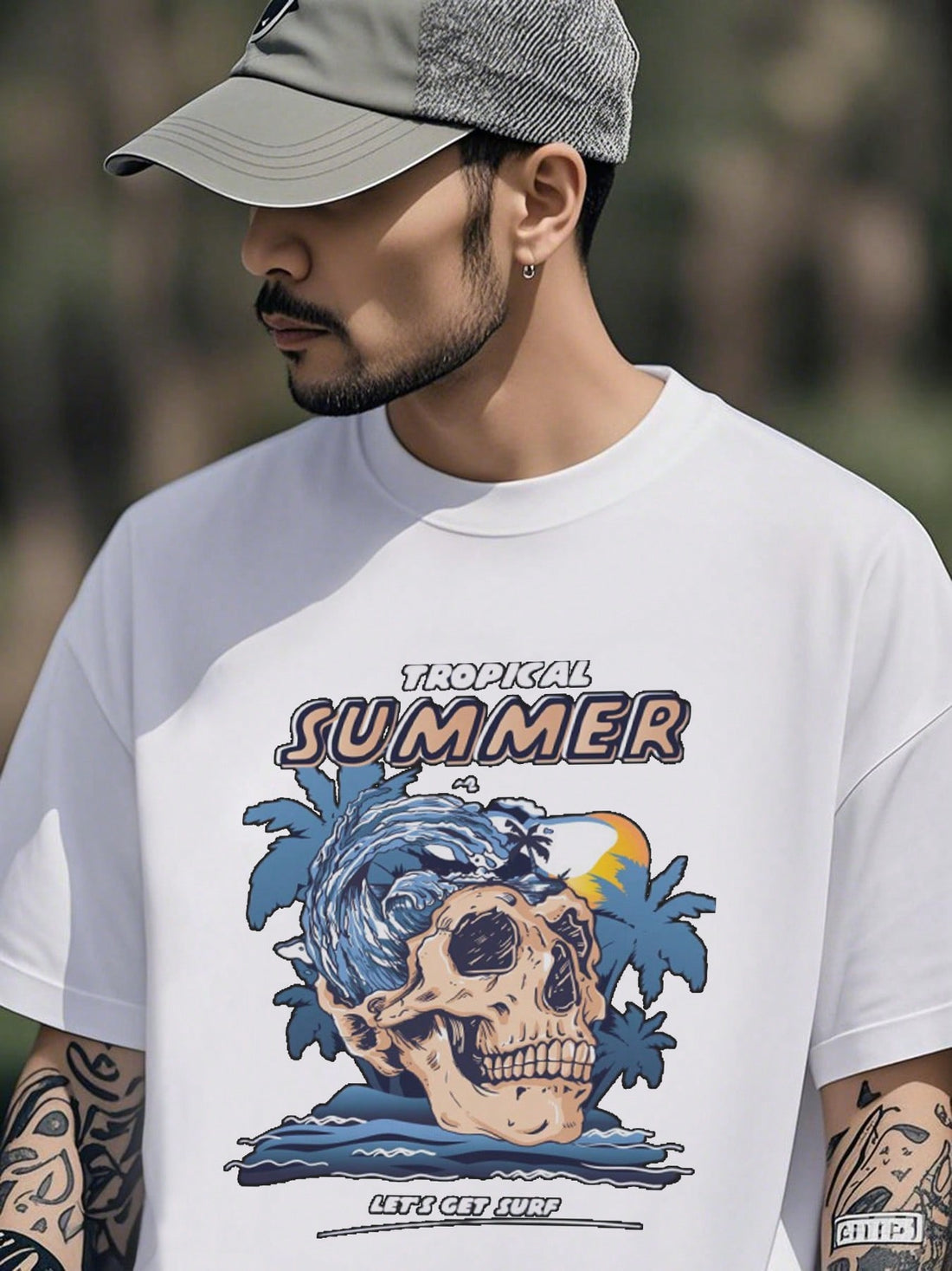 Introducing our Tropical Skull Surf Cotton Tee - the perfect addition to your summer adventures! Made from heavyweight cotton, this tee is designed for days spent at the beach, surfing and soaking up the sun. Embrace the fun and quirky design of a tropical skull - a playful twist on classic beach style.