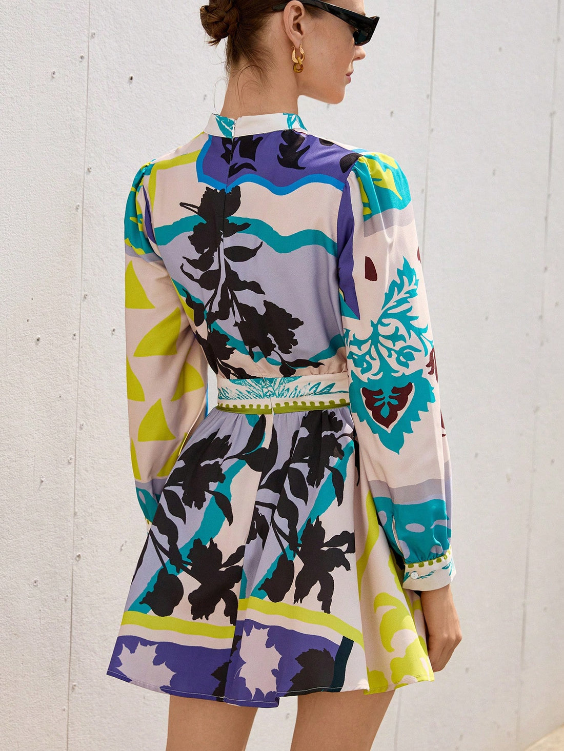 Step into vacation mode with this playful floral print A-line dress! Featuring a flattering V-neck and breezy long sleeves, it’s perfect for sunny strolls or sunset dinners. The short, flirty cut adds a fun twist, making it your go-to for effortless style wherever you wander.