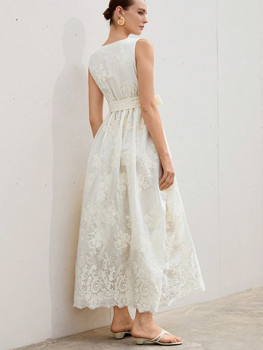 Step into romance with this elegant full-length dress featuring charming 3D embroidery and a flattering sash tie. Its delicate details and flowing silhouette make it the perfect choice for dreamy vacations and special moments. Feel confident and effortlessly stylish wherever your adventures take you!