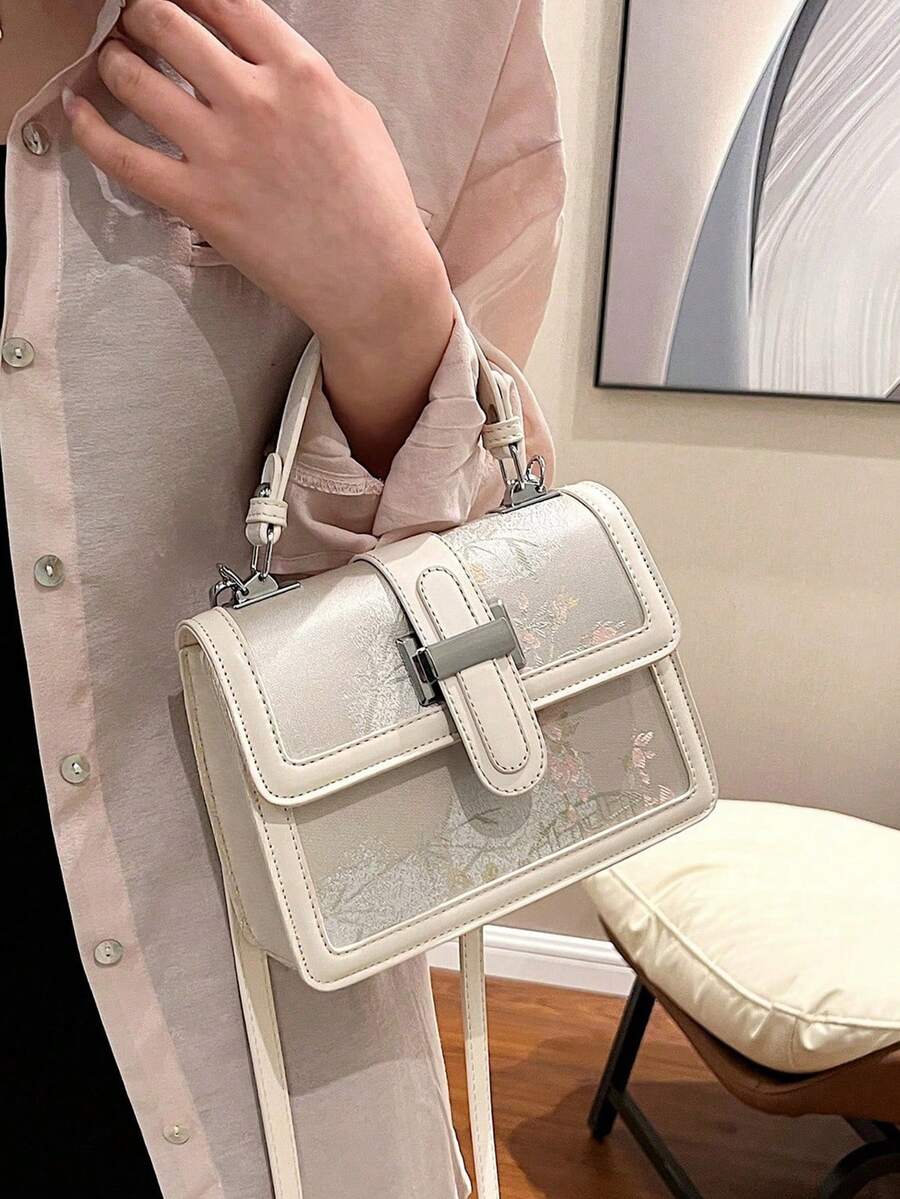 Pink botanical handbag with structured sides
