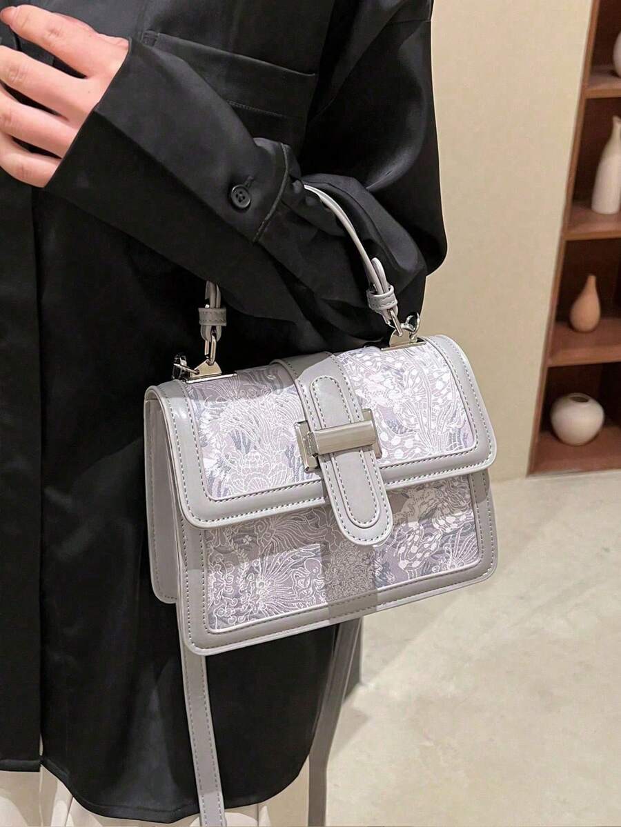 Gray floral handbag with short top handle