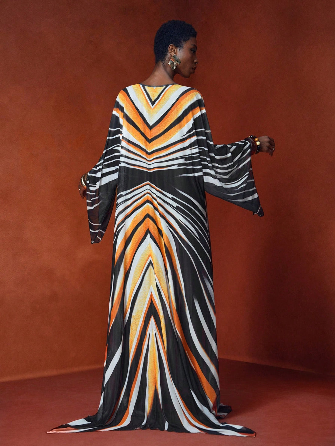 Step into sun-soaked days with this Elegant Vintage Maxi Jumpsuit, perfect for your spring and summer island escapes. Its flowing silhouette and timeless design keep you effortlessly chic while you soak up the breeze. Whether wandering sandy shores or sipping cocktails at sunset, this jumpsuit blends vintage charm with vacation-ready comfort for your most stylish getaway.