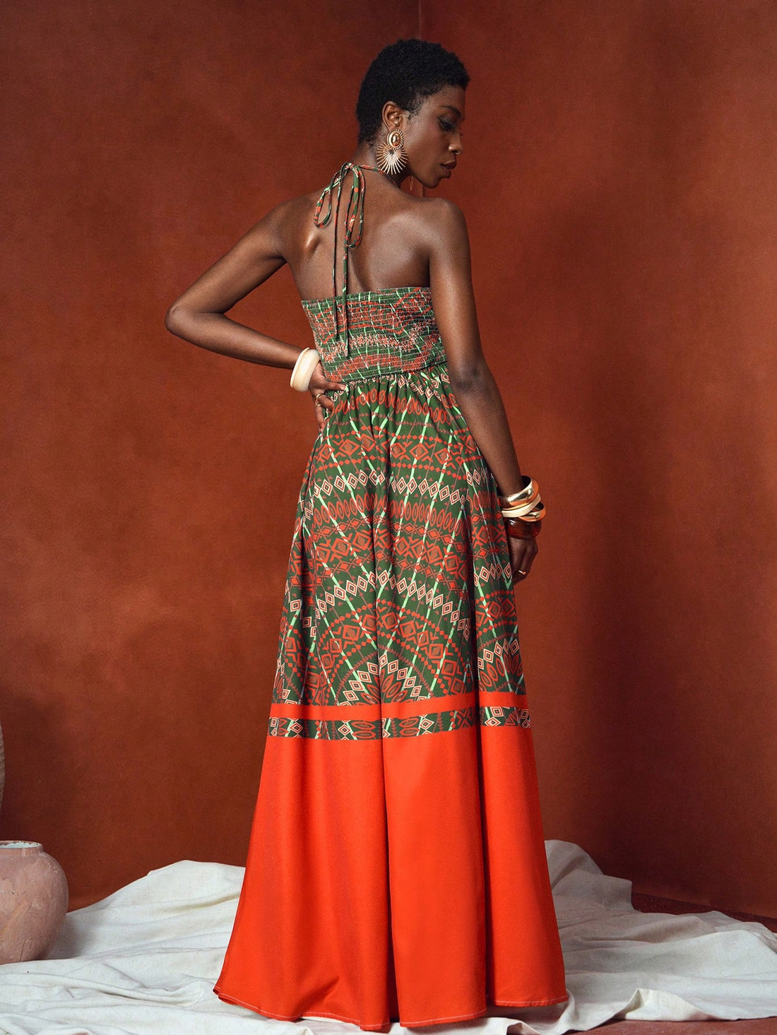 Embrace sunny days in this playful Bohemian Summer Maxi Dress, featuring a breezy halter neck and charming diamond plaid pattern. Perfect for beach strolls or casual outings, its flowing silhouette keeps you cool and effortlessly stylish all day long. Let your carefree spirit shine with every step!