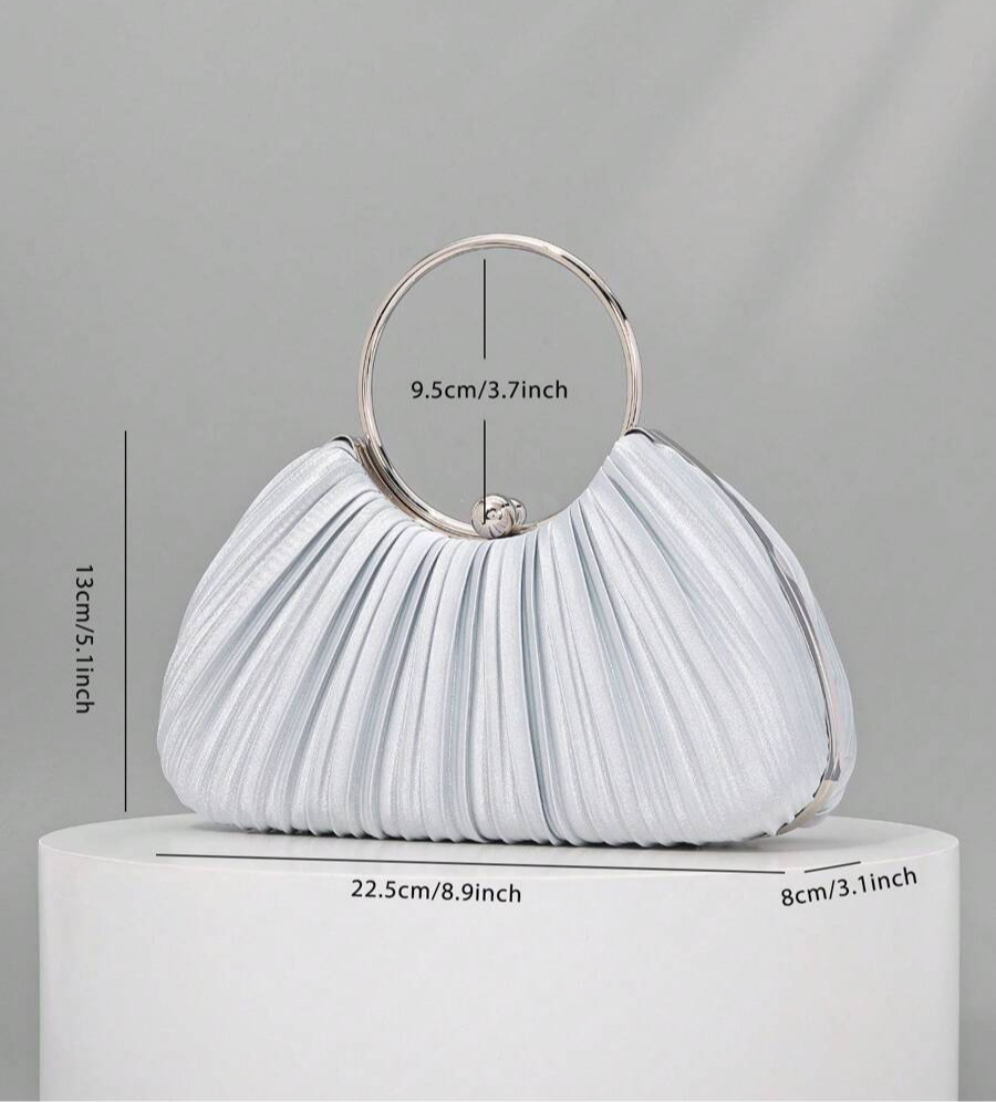 Turn heads effortlessly with this Luxury Metallic Evening Bag, the perfect high-end leather clutch for weddings, parties, and any special occasion. Its shimmering metallic finish adds a dash of glam, while the sleek design keeps your essentials stylishly secure. Dance the night away knowing your bag matches your sparkle!