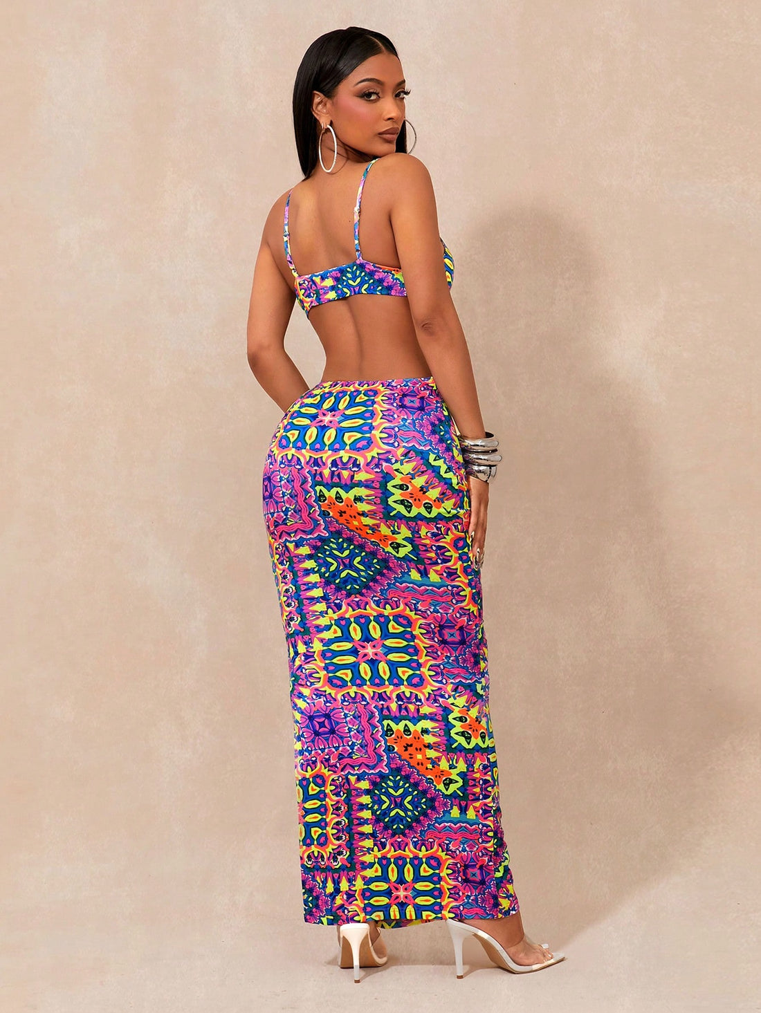 Step into carefree style with this Elegant Bohemian Geometric Print Maxi Dress. Featuring a breezy silhouette and a playful high slit, it’s your go-to for beach days and casual adventures. The bold geometric patterns add a touch of boho chic that turns heads wherever you wander. Comfortable and effortlessly stylish, this dress keeps you feeling light and fabulous all day long.