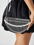 Close-up view of elegant semicircular pearl-chain handbag: versatile evening clutch for parties and special occasions with pearl chain, chain strap, semicircular shape for evening occasions