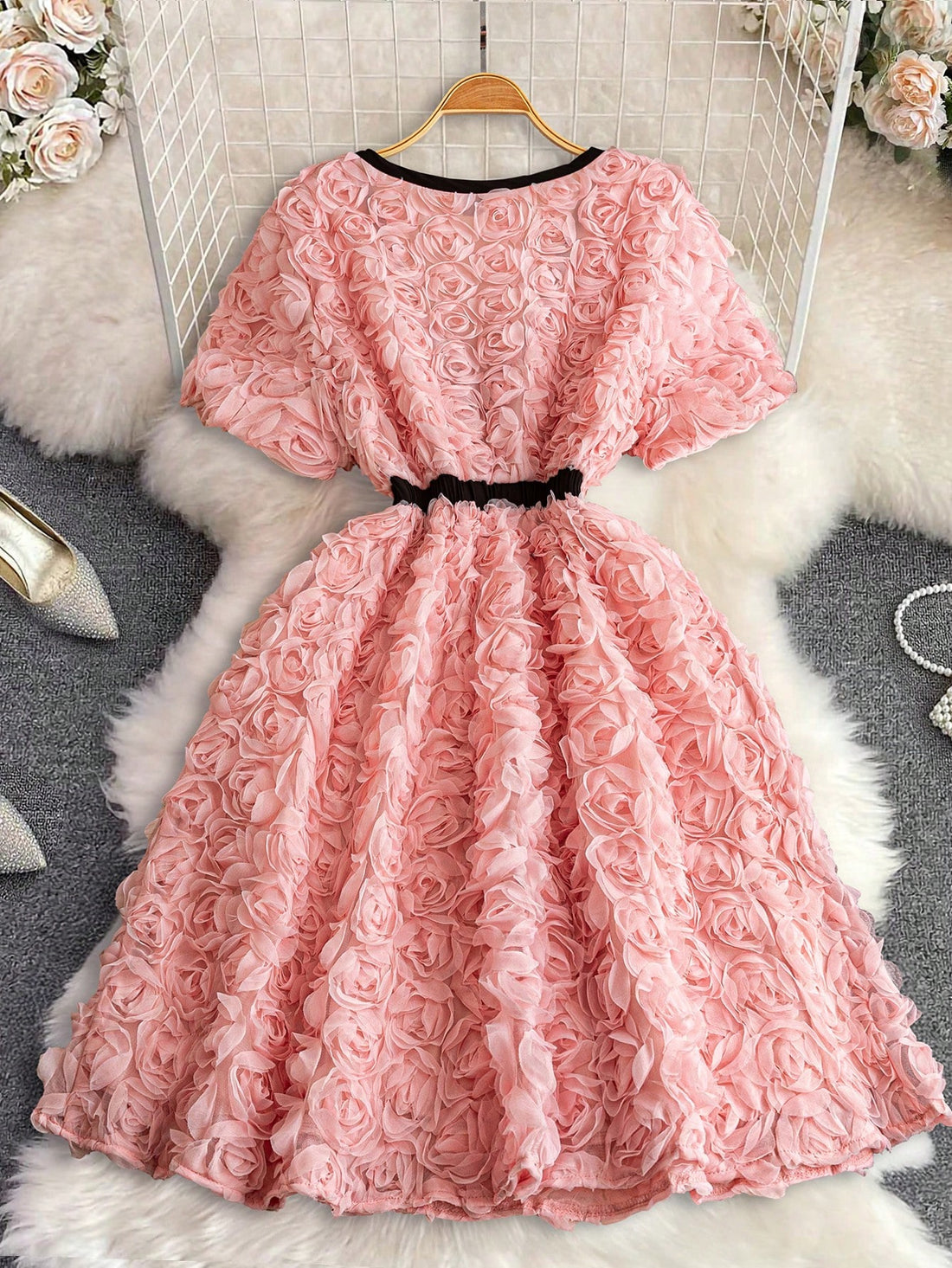 Turn heads on your next romantic date with this playful plus size mini dress. Featuring a deep V-neck and charming 3D rose details, it perfectly blends elegance with a flirty vibe. Designed to celebrate your curves, this dress adds a touch of romance and confidence to your evening look.