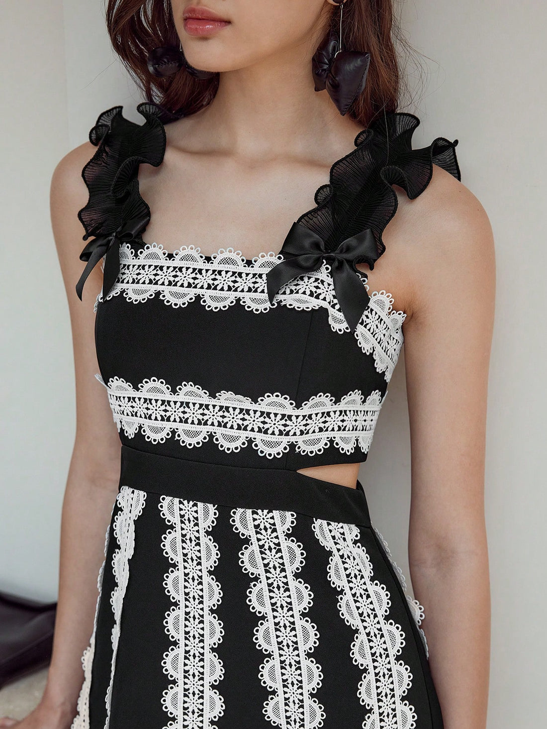 Step out in style with this playful colorblock dress featuring a charming lace bow detail. Its contrasting panels add a fun twist, making it perfect for turning heads at any stylish occasion. Comfortable and chic, it’s your go-to for effortless elegance with a flirty flair.