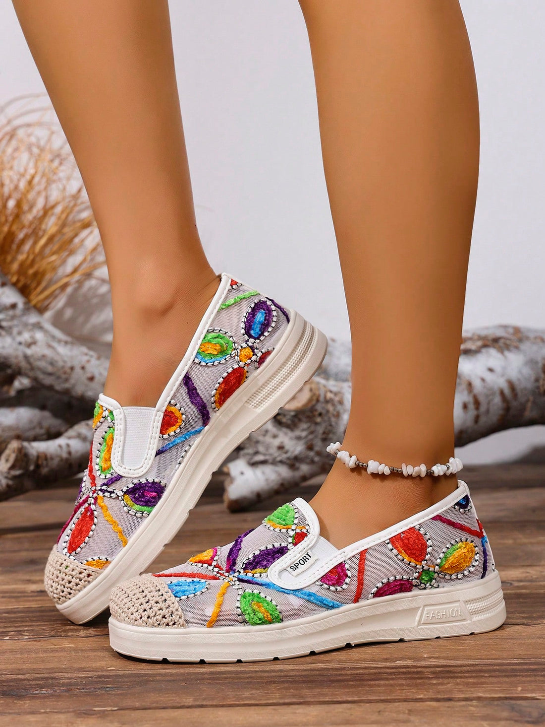 Step into summer with these Bohemian-style embroidered casual sneakers designed for women who love a playful twist on comfort and fashion. Featuring vibrant embroidery that adds a splash of color and personality, these sneakers are perfect for sunny days and carefree adventures. Lightweight and breathable, they keep your feet happy while you express your unique style effortlessly. Whether you're strolling through the city or enjoying a weekend getaway, these sneakers bring a fun, boho vibe to every step.