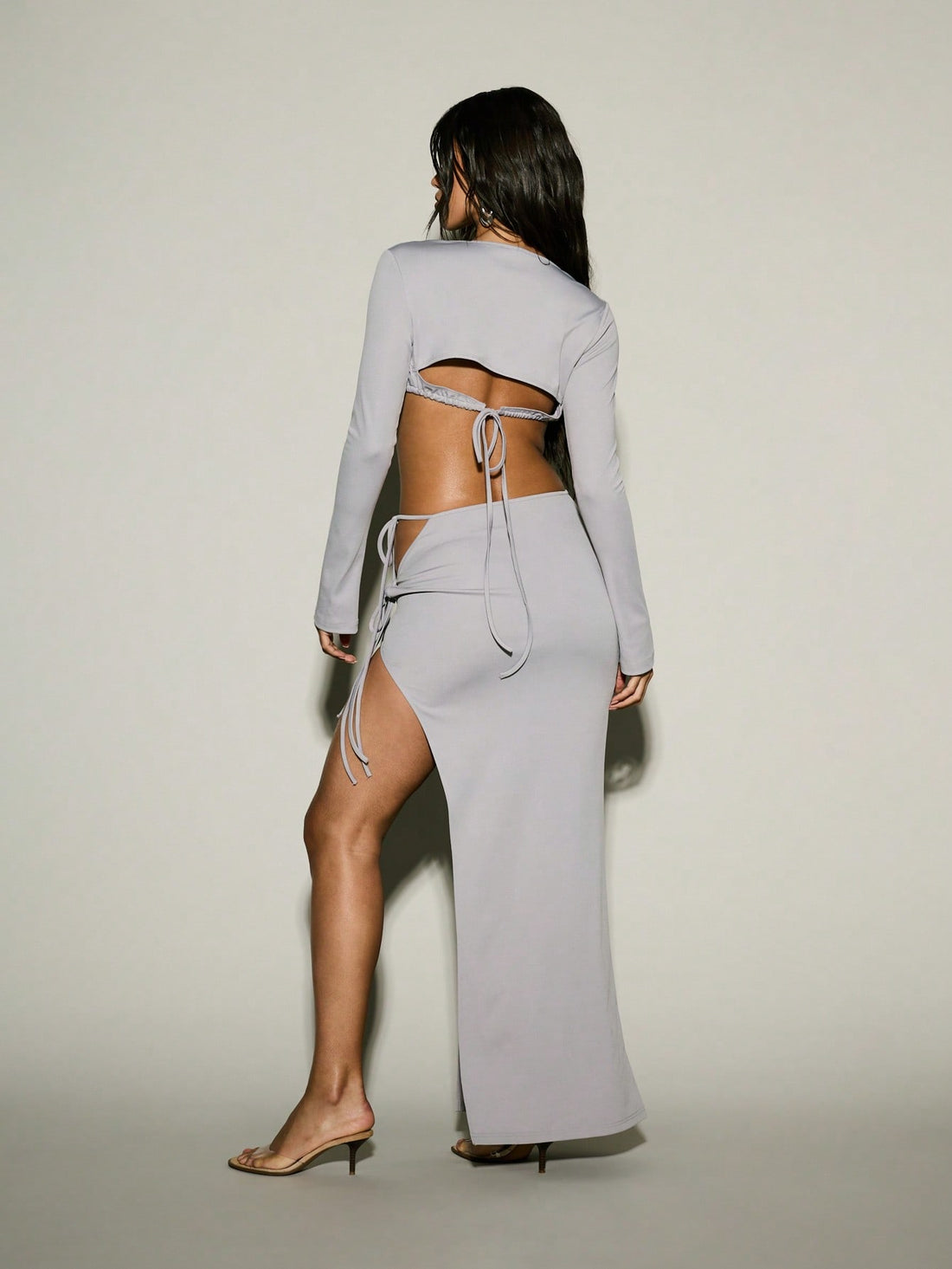 Elevate your everyday look with this stunning two-piece set that effortlessly blends sophistication and comfort. The long-sleeve crop top features eye-catching stone detailing that adds just the right amount of sparkle, while the flowing maxi skirt with a chic side split keeps things breezy and modern. Perfect for date nights, casual outings, or whenever you want to feel put-together without trying too hard. Mix, match, or wear together—this set is your new go-to for looking fabulous with minimal effort.