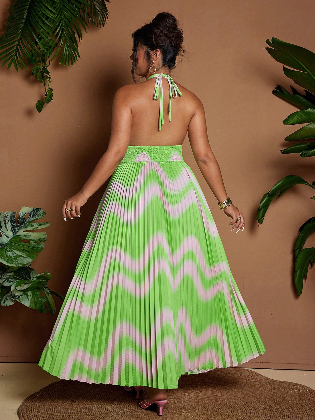 Step into endless summer vibes with this Plus Size Ombre Print Midi Dress. Featuring a playful ombre print and a cinched waist for a flattering fit, it flows effortlessly with a charming ruffle hem. Perfect for beach resorts or sunny days, this dress combines comfort and style to keep you cool and confident all day long.