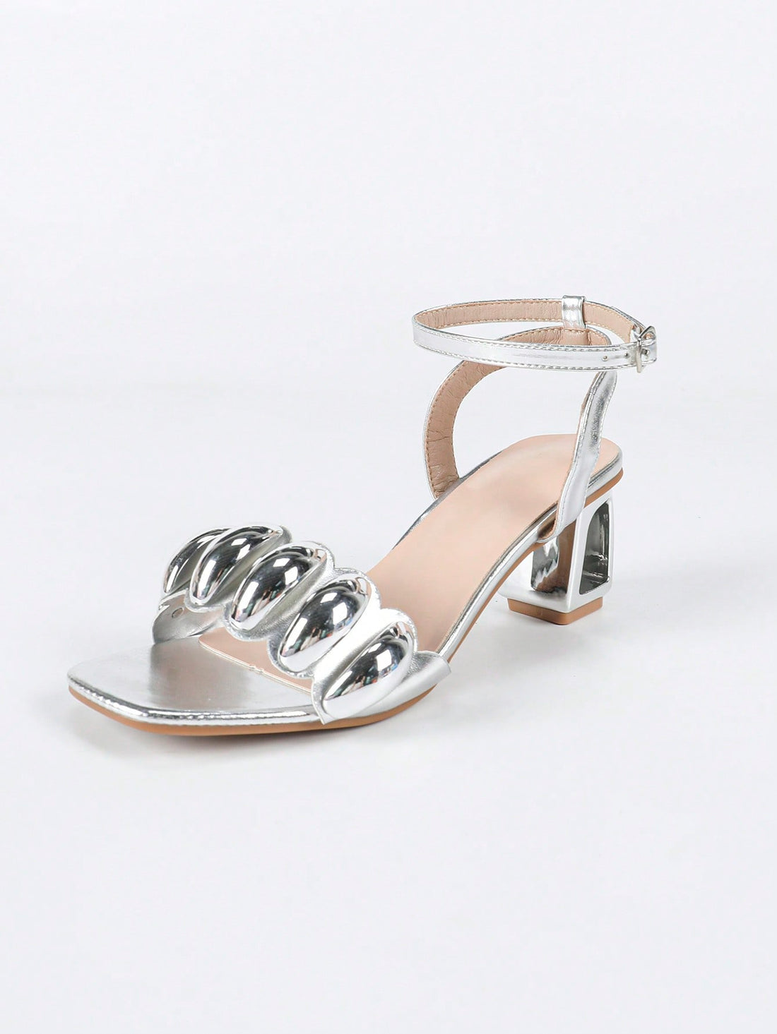 Step into summer with these Elegant Silver Chunky Heeled Sandals! Their shiny silver finish adds a touch of sparkle to any outfit, while the chunky heel offers both style and comfort for all-day wear. Perfect for dressy occasions or casual outings, these sandals bring a playful yet polished vibe to your warm-weather wardrobe. Get ready to turn heads and dance the night away in effortless style!