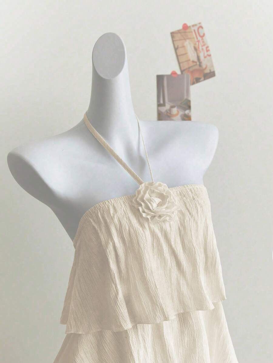 Step into the spotlight with this Elegant White 3D Floral Sleeveless Dress! Its delicate floral details add a touch of whimsy, while the sleeveless design keeps things cool and breezy. Whether you're dancing at a garden party or turning heads at a casual brunch, this dress is your go-to for effortless charm and style.