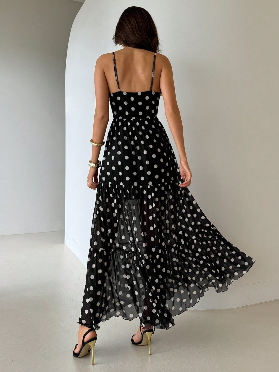 Step out in style with the Chic Polka Dot Cami Long Dress, your go-to choice for graduation and teacher events. Its playful polka dot pattern and flowing silhouette offer a fun yet elegant vibe, making every moment feel special. Lightweight and comfortable, this dress keeps you looking effortlessly chic all day long. Perfect for stylish women who love to blend charm with confidence!