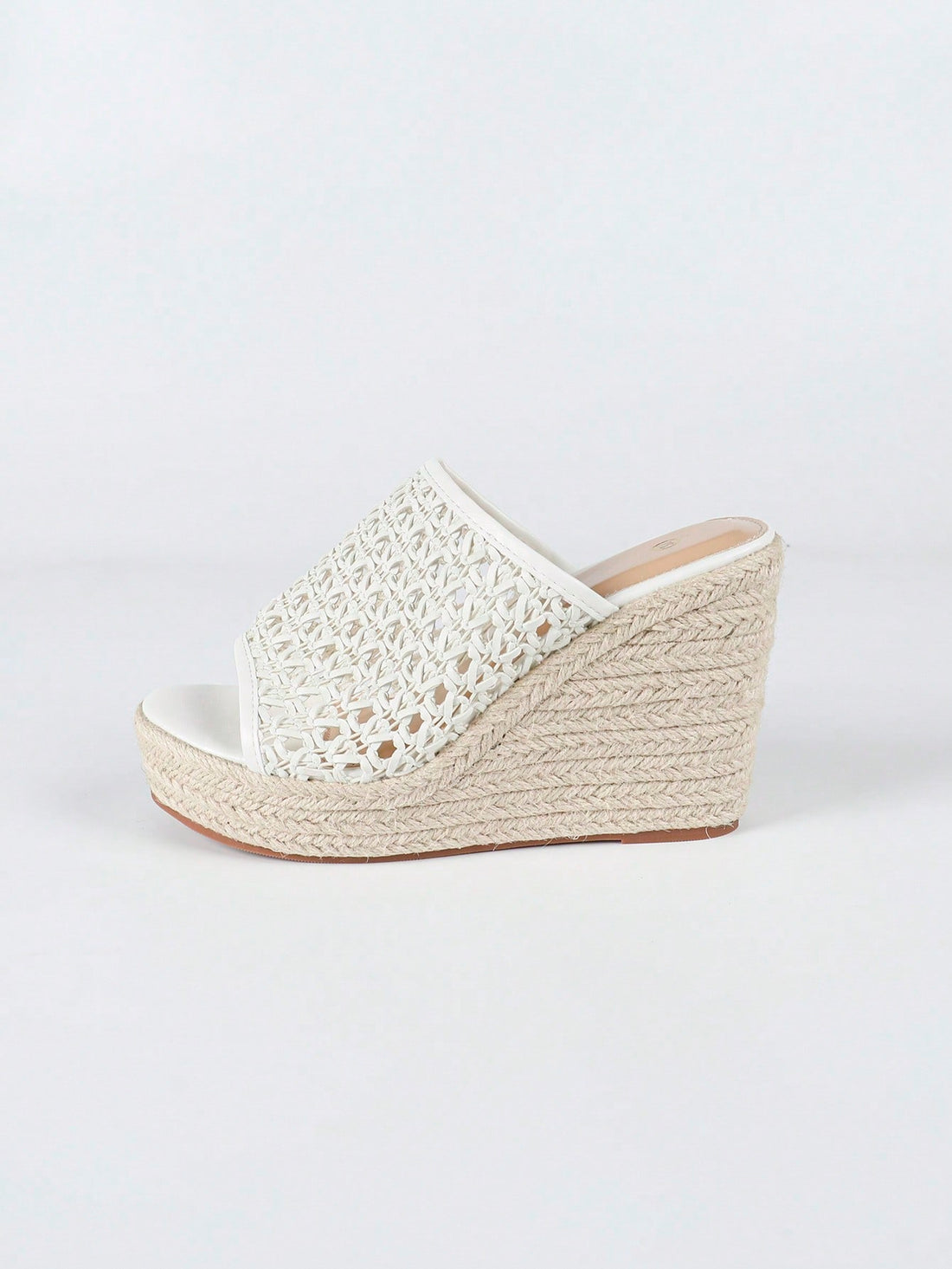 Step into summer fun with these Woven Hollow-Out Platform Wedge Slide Sandals! Their chunky platform adds a playful boost, while the breathable woven design keeps your feet cool and comfy all day. Perfect for beach days or casual strolls, these versatile slippers bring effortless style and a touch of whimsy to every outfit.
