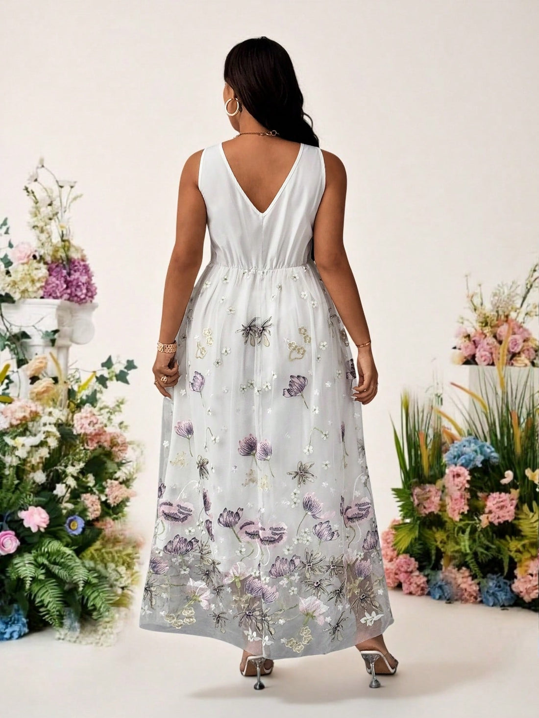 Step into summer with this playful plus size dress designed to turn heads. Featuring delicate floral embroidery and airy mesh patchwork, it blends comfort with whimsical charm. Perfect for sunny days and balmy nights, this dress offers a flattering fit that keeps you feeling breezy and beautiful all season long.