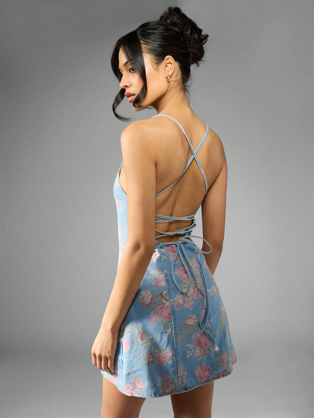 Step into spring with this playful Floral Denim Mini Dress featuring a charming lace-up back. Its flattering A-line silhouette combines retro Y2K vibes with fresh garden party style, making it perfect for sunny days and fun nights out. Lightweight denim ensures comfort while the floral pattern adds a touch of whimsy to your wardrobe.
