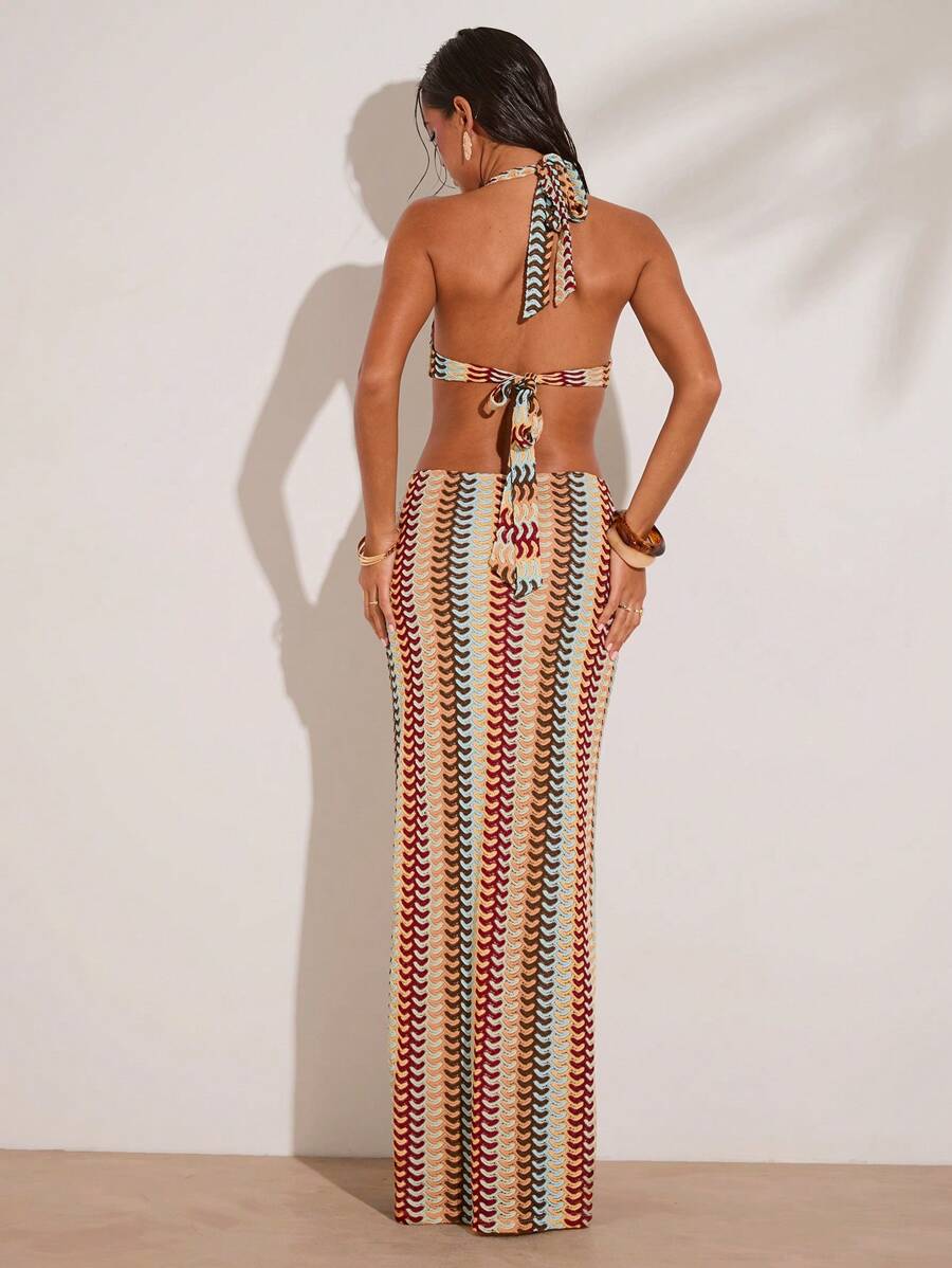 Rear view of multicolor halter maxi dress with open tie-back design