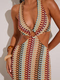 Close-up of V-neck ring detail and side cutout on multicolor halter maxi dress