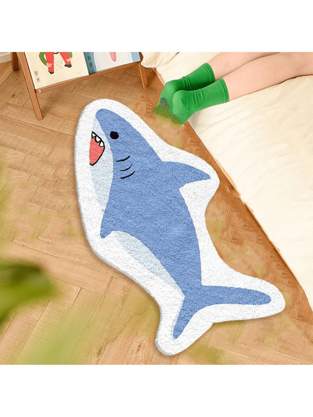 Dive into comfort with this adorable plush shark bathroom mat! Soft and cozy underfoot, it features a non-slip backing for safety and is fully washable for easy care. Its unique asymmetrical design adds a splash of fun and style to any bathroom or bedroom, making every step a delightful experience. Perfect for those who love a playful touch in their home decor!