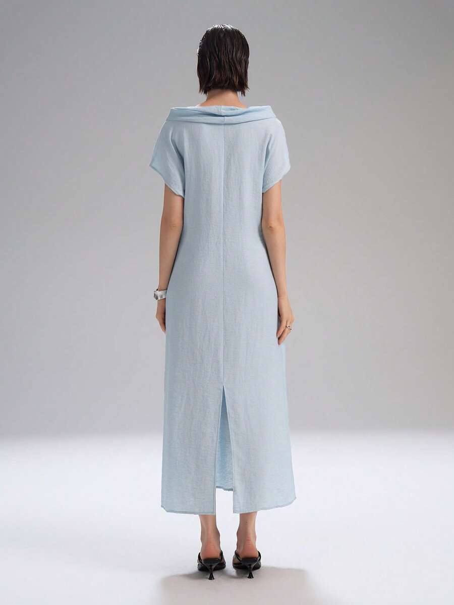 Step into effortless charm with this chic light blue long dress, featuring playful cap sleeves and a stylish draped neck. Perfect for vacation strolls or countryside escapes, it combines comfort and elegance to keep you feeling fabulous wherever you go.